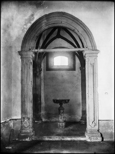 Baptismal font in its niche at Mission Carmel, Monterey, ca.1907