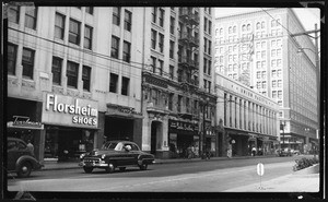 Pershing Square shops along the south side of Sixth Street near Olive Street, ca.1950-1960