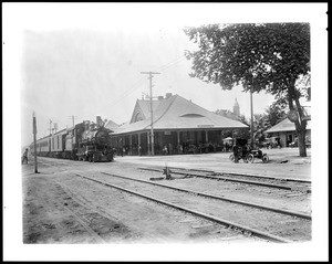 Steam locomotive passing in front of the Southern Pacific Railroad Depot in Stockton, ca.1900