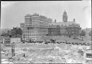 View of City Hall under construction in front of the old Hall of Justice and the Hall of Records in Los Angeles