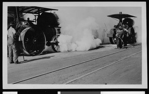 Construction work on an unidentified asphalt street