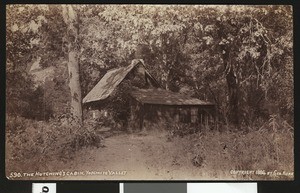Exterior view of Hutching's cabin in Yosemite National Park, 1884