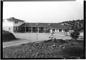Exterior view of a stable at Kellog's Horse Ranch in Pomona, 1937