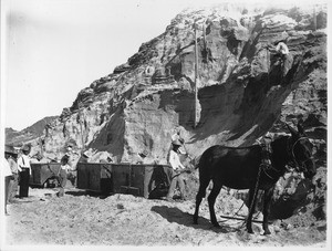 Donkey and rail cars for hauling ore at mine run by Free Gold Mining Company, Hedges, ca.1905