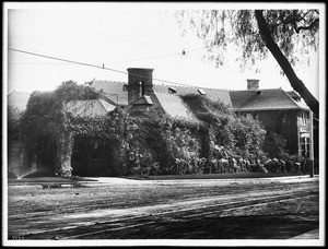 Exterior view of the Casa de Rosas School for Young Ladies on the corner of Adams Boulevard and Hoover Street, ca.1905