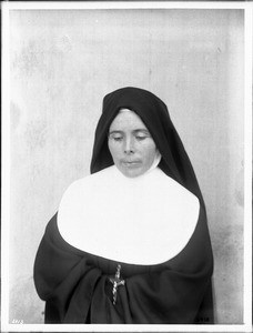 Portrait of a sister with downcast eyes at Mission San Carlos Borromeo, Monterey, ca.1906