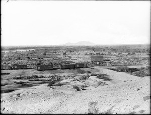 Four Southern Pacific freight cars on a siding on the Yuma Indian reservation, Arizona, ca.1900