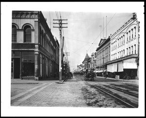 View of the corner of Main Street and American Street, looking west on Main Street, ca.1900