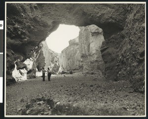 Fifty-five foot high natural bridge in Death Valley, ca.1900-1950