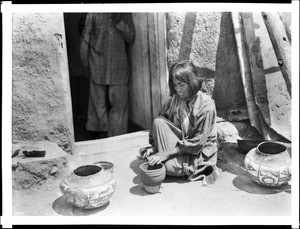 Tseuahejo's wife making pottery, ca.1898