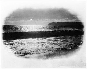 View of the sun setting off of Point Loma as seen from Coronado Beach, San Diego, ca.1910