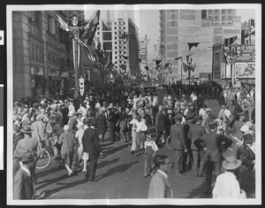 Crowd dispersing at a parade for Charles Lindbergh near the Chamber of Commerce building, on September 20, 1927