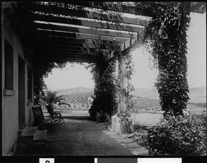 J.H. Klein's pergola by a lake, ca.1900