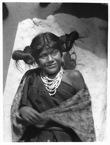 Hopi Indian maiden in the village of Shonguapavi, ca.1901