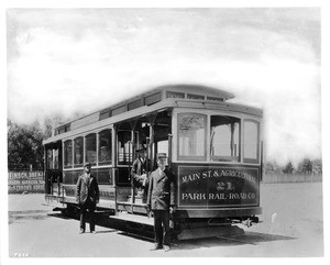 Streetcar with conductors at the Agricultural Park and Main Street terminal of the street railway system, 1897