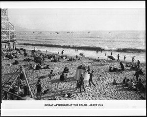 Beach goers on a Sunday afternoon at Redondo Beach, ca.1924