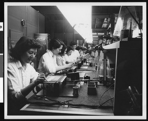 Women workers on assembly line at the International Telemeter Corporation, ca.1940