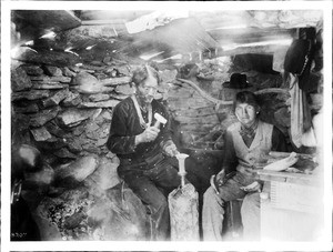 Peshliki, a Navajo Indian silversmith, in his shop on the Tohatchi Indian Reservation near Gallup, New Mexico