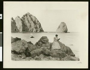 Woman reading a book at Sugar Loaf, Santa Catalina Island, 1892