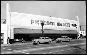 Exterior view of the Picworth Market located at Pico Boulevard and Hayworth Avenue, taken from across the street, ca.1940