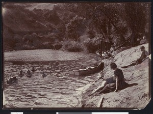 Men and women bathing in the Russian River in Healdsburg