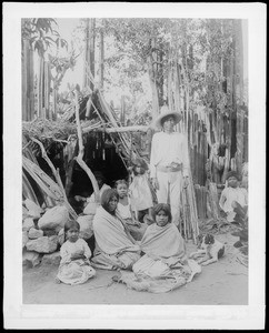 Yaquis Indians of Mexico by their hut, ca.1910