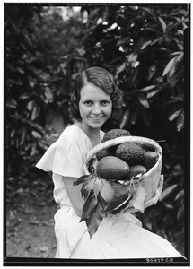 Miss Margaret Thornton with Calavo avocados, May 1932