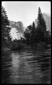 Merced River moving at an angle near a few trees, Yosemite National Park, California