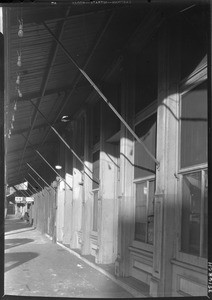 Covered walkway on the east side of Los Angeles Street in Chinatown, November 1933