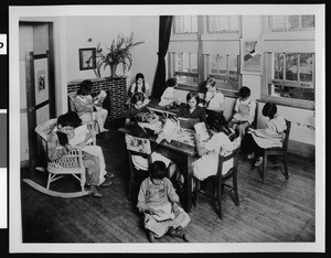 Children reading books in the library of the Solano Avenue School