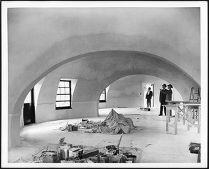 Three men inspecting the unfinished interior of one of Wallace Neff's bubble houses, 1940-1949