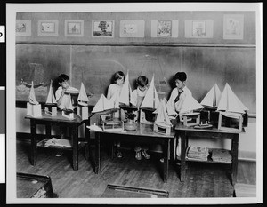 Unknown school, showing children making model yachts