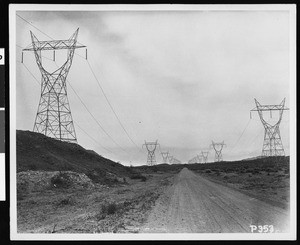 "General view of a complete section of Boulder Dam transmission line in Silver Lake District, near Silver Lake Camp, showing copper cable in place", ca.1930