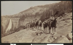 Horseback riders on a trail in Yosemite National Park, ca.1920