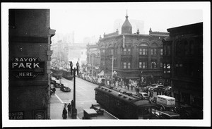 Several street cars running through the intersection of 3rd and Hill Streets, ca.1938