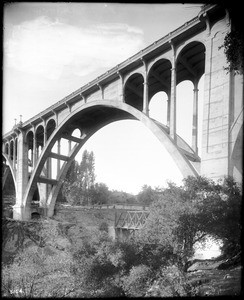 Colorado Street Bridge from beneath, with an older bridge still standing under it, lower in the Arroyo Seco, Pasadena, ca.1915-1920