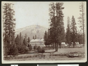 Exterior view of Wawona Hotel from the meadows in Yosemite National Park, ca.1900