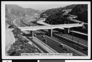 Postcard of the Cahuenga Pass Freeway with some traffic, ca.1940-1949