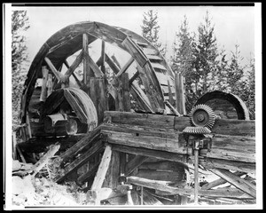 Old waterwheel at the Shelton Mine in Mammoth City, ca.1930