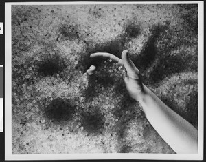 Unidentified factory product of tiny pellets, ca.1930