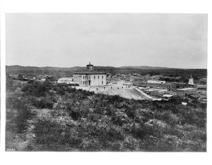 Panoramic view of Los Angeles showing the first high school atop Pouncake (later Court) Hill, ca.1875