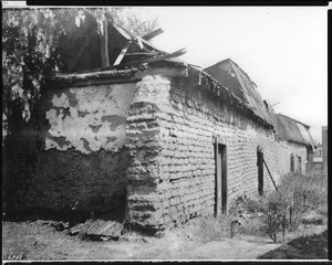 Exterior side of an adobe built on North Broadway by Don Enrique Sepulveda in Sonora Town, Los Angeles, ca.1900