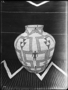 Unidentified Indian basket on display, ca.1900