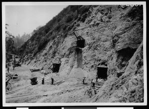 Openings in a hillside during the construction of a bridge