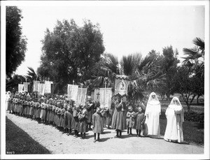 Procession of orphans girls with Dominican sisters at Mission San Jose, 1904