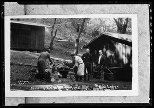 People cooking at Fern Lodge in Big Santa Anita Canyon above Sierre Madre