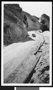 Automobile on an unidentified mountain pass, ca.1920