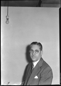 Portrait of a man with a lightbulb