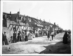 Procession of Mexican and Indian women during the Fiesta de San Esteban (Saint Stephen), Acoma Pueblo, ca.1900