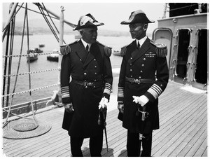 Two officers on the deck of a navy ship